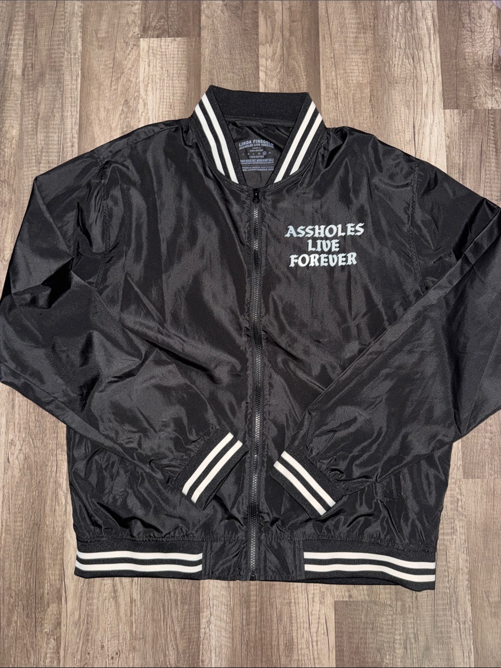 Linda Finegold: Assholes live forever track jacket.